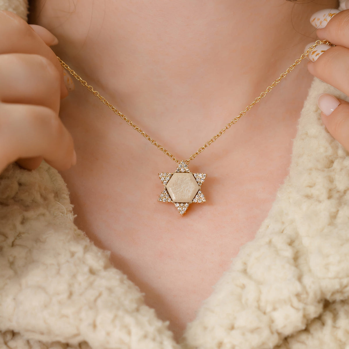 star-of-david-pendant set in gold and diamonds