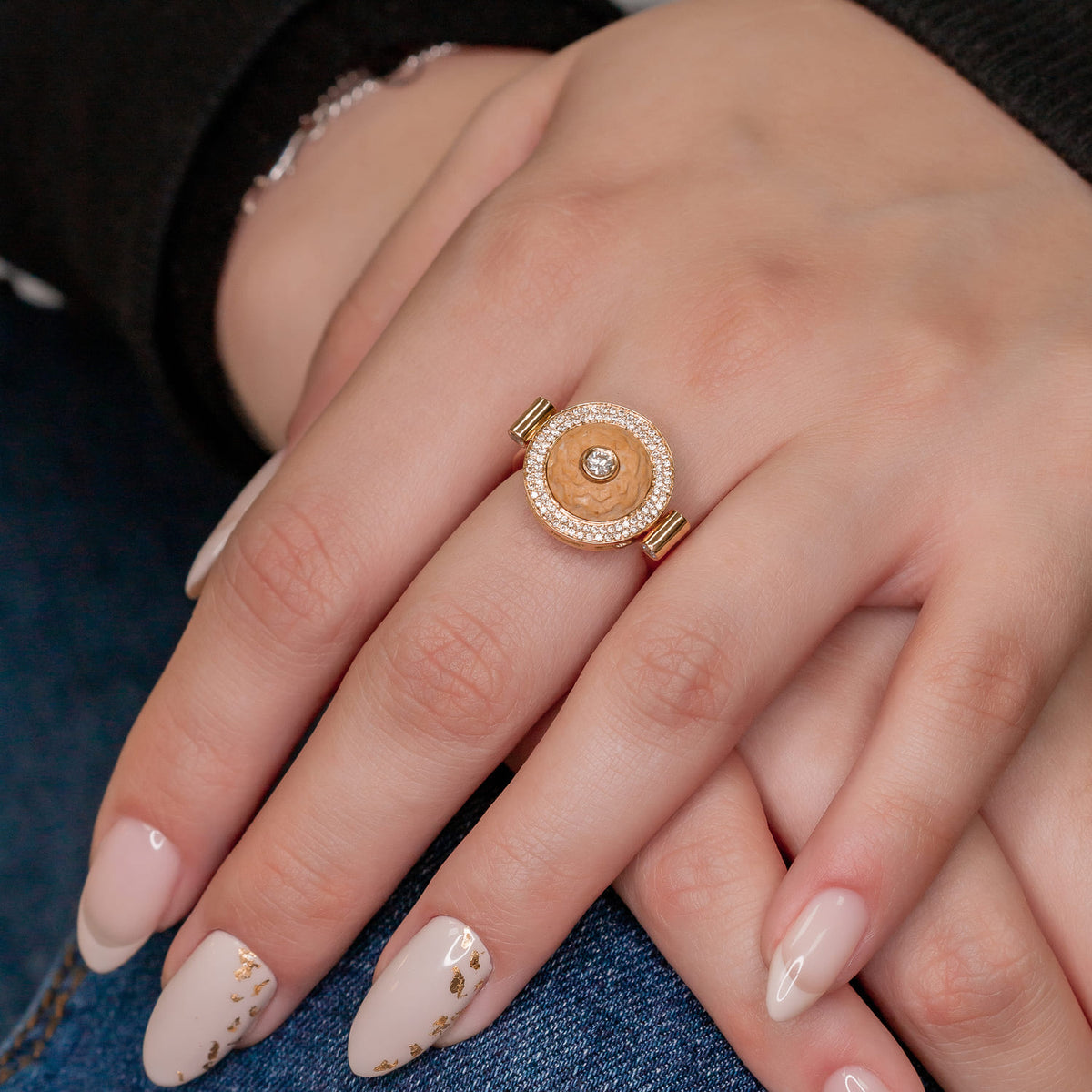 Temple Mount stone flipping ring set in gold and diamonds