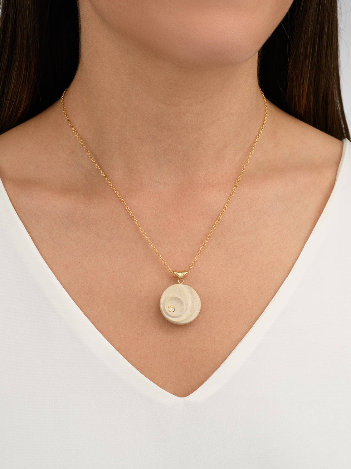 Moriah’s Diamond Jewelry Collection with Temple Mount Stone. Gold and Diamond Circles Pendant set with a single diamond