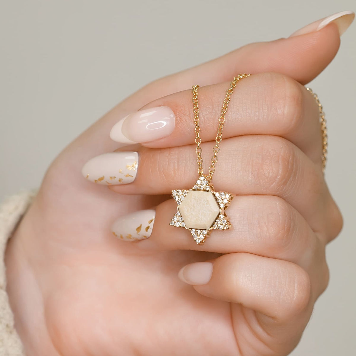 star-of-david-pendant set in gold and diamonds